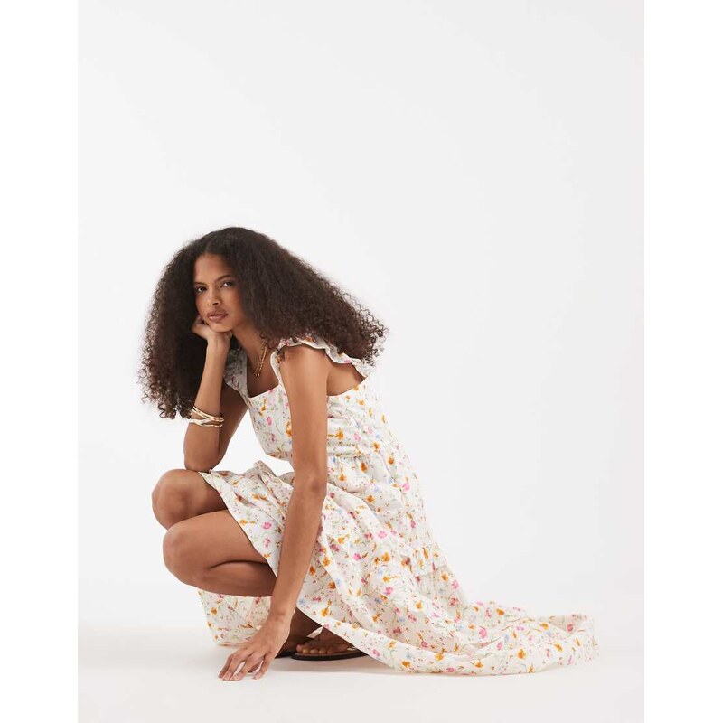 Vero Moda ruffle trim tiered maxi dress in cream based floral