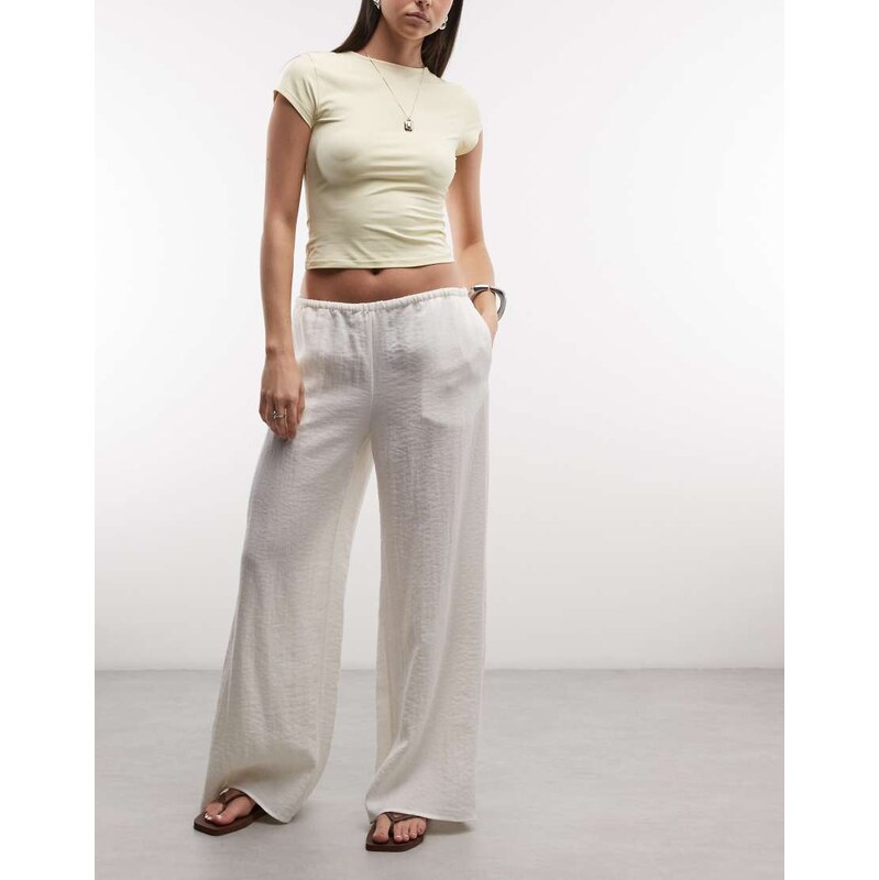 Weekday pull on wide leg crinkle trousers in white exclusive to