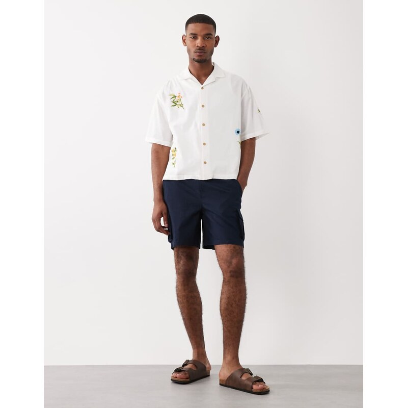 ASOS DESIGN wide shorter length cargo short in navy ripstop