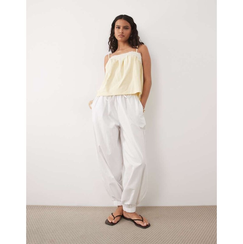 ASOS DESIGN contrast lace detail cami in pastel yellow