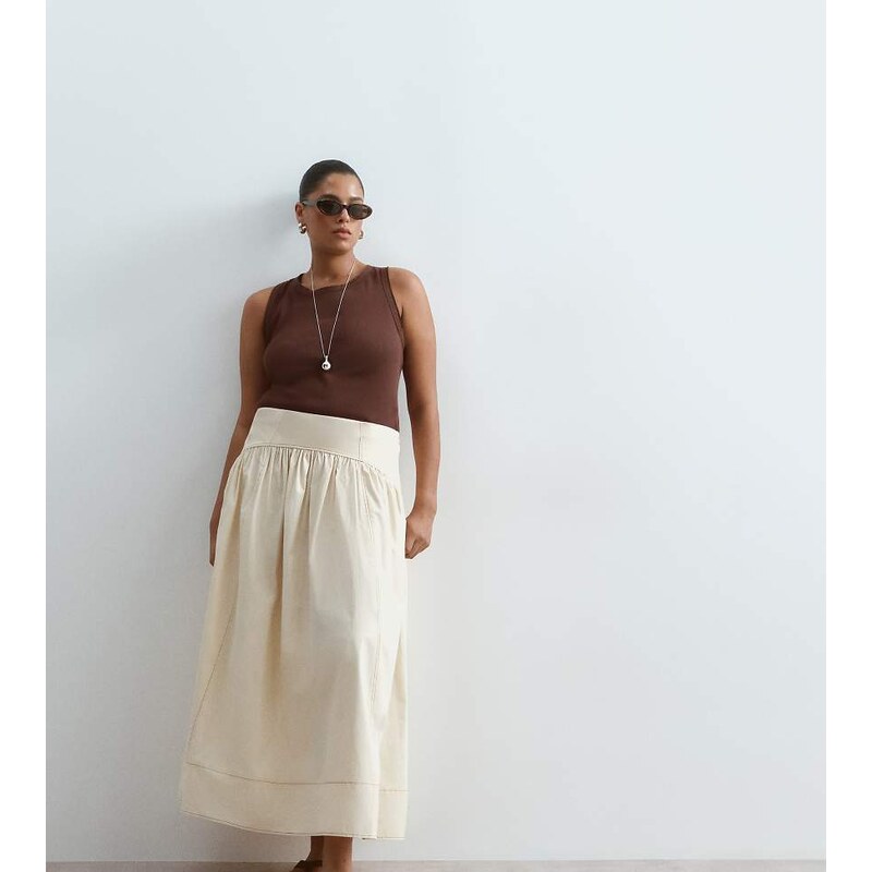 ARRANGE Curve drop waist maxi skirt with topstitching detail in