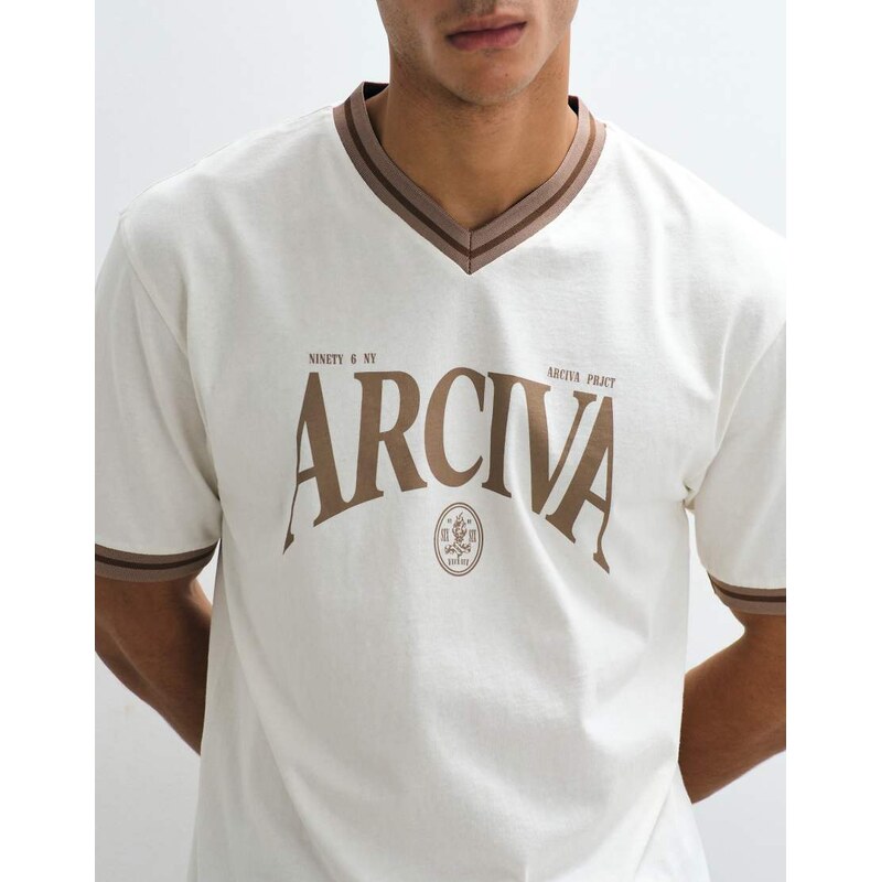 ASOS DESIGN relaxed ringer t-shirt with arciva graphic in cream