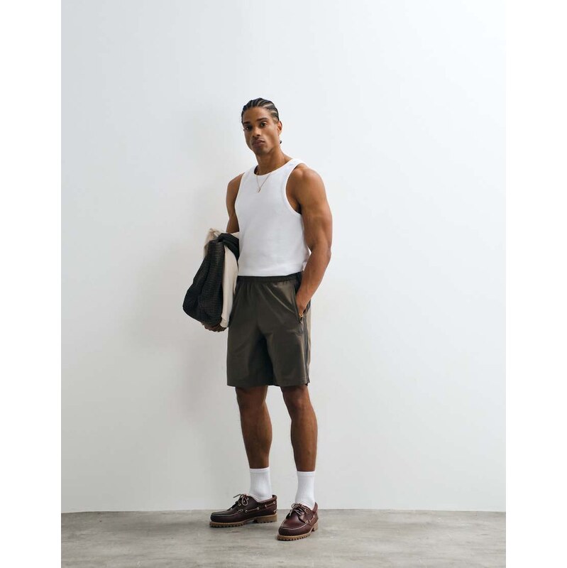 adidas Originals firebird shorts in khaki-Green