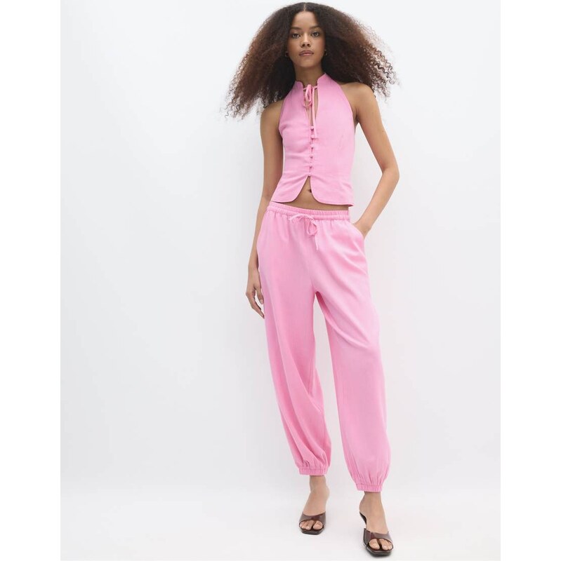Stradivarius Linen-effect sarouel trousers in pastel pink