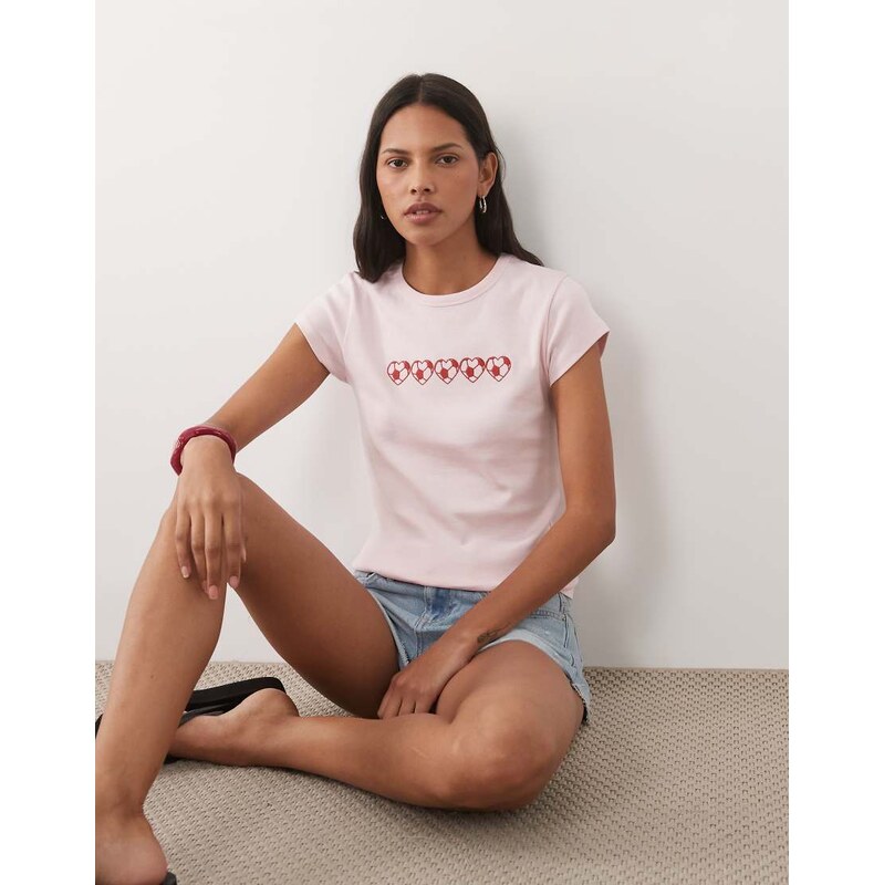 Miss Selfridge baby tee with football graphic in light pink