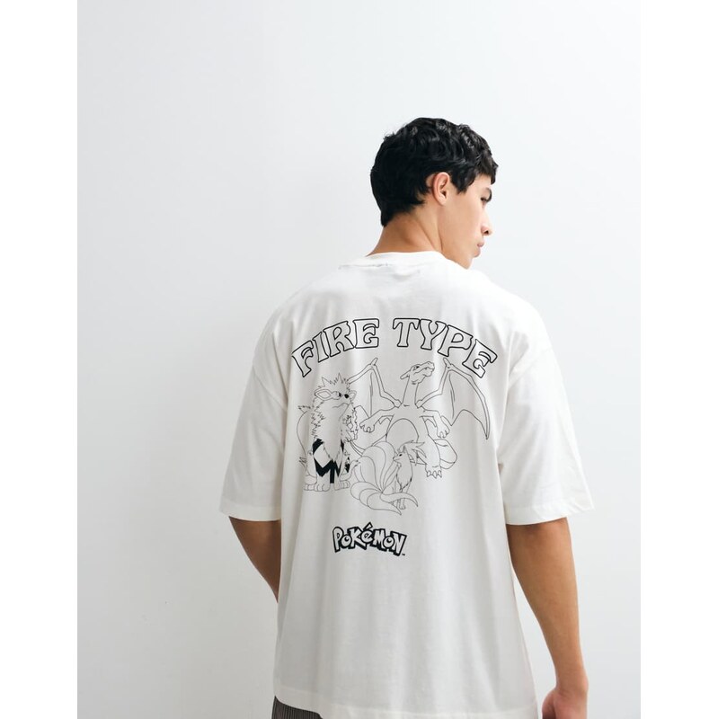 ASOS DESIGN oversized t-shirt with Pokemon Fire Type in Coconut