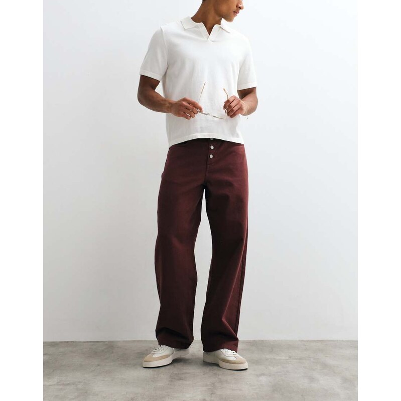 ASOS DESIGN baggy trousers with exposed buttons in brown