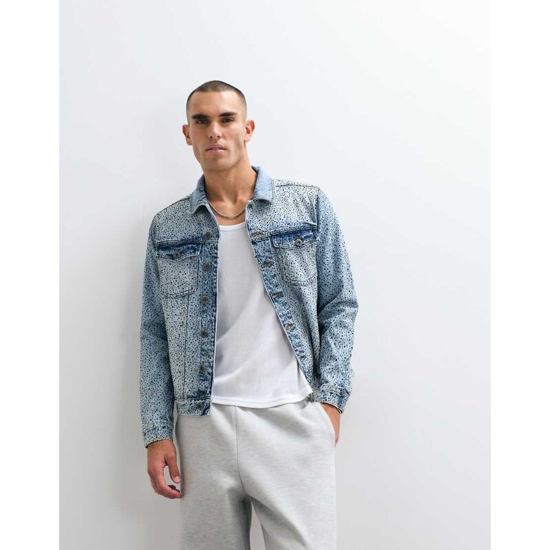 Courtside distressed denim jacket with rhinestone embellishment
