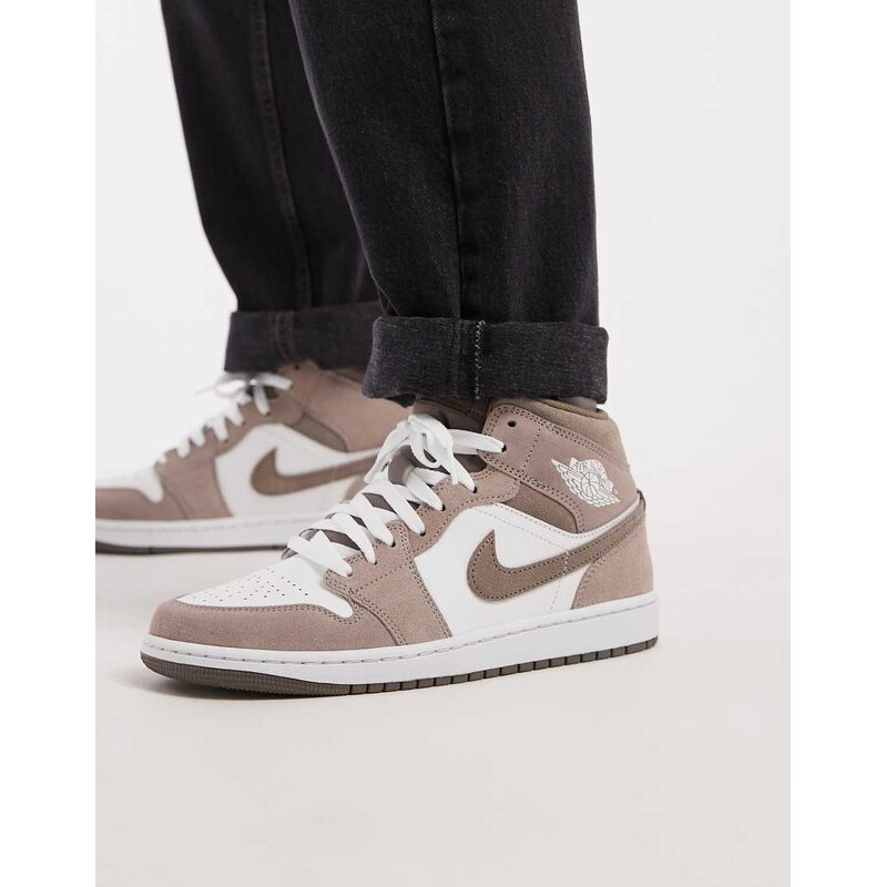 Nike Air Jordan 1 mid trainers in brown and white