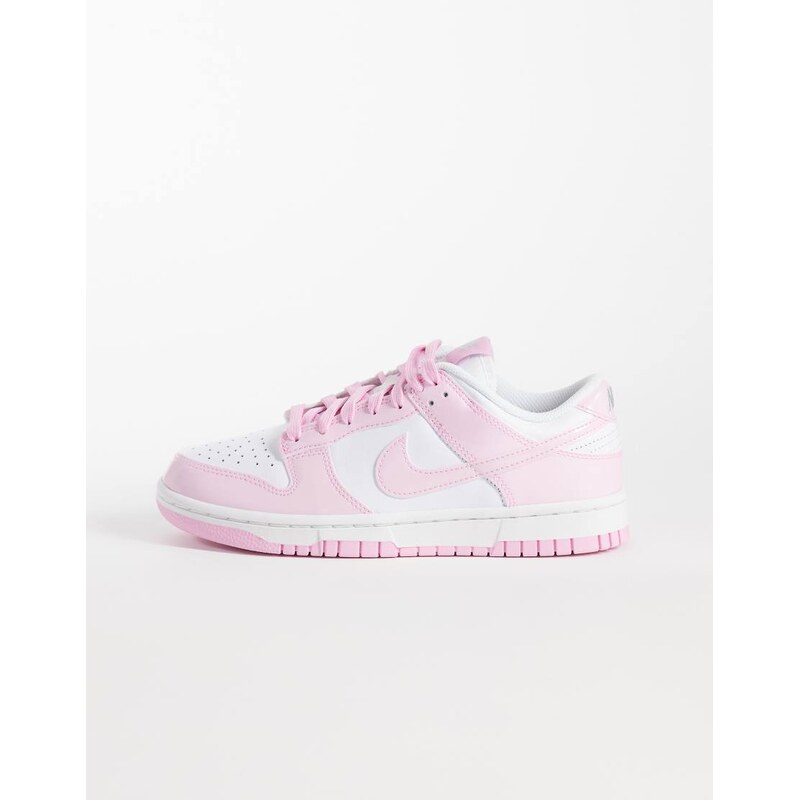Nike Dunk Low trainers in pink and white