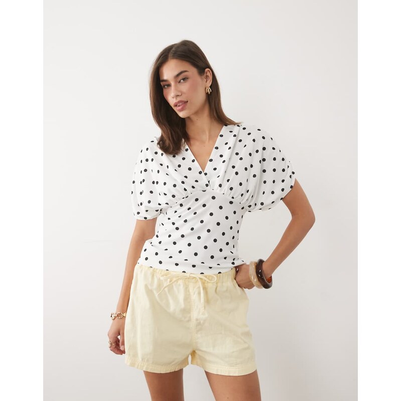 ASOS DESIGN plunge with cinched waist top in stone polka dot