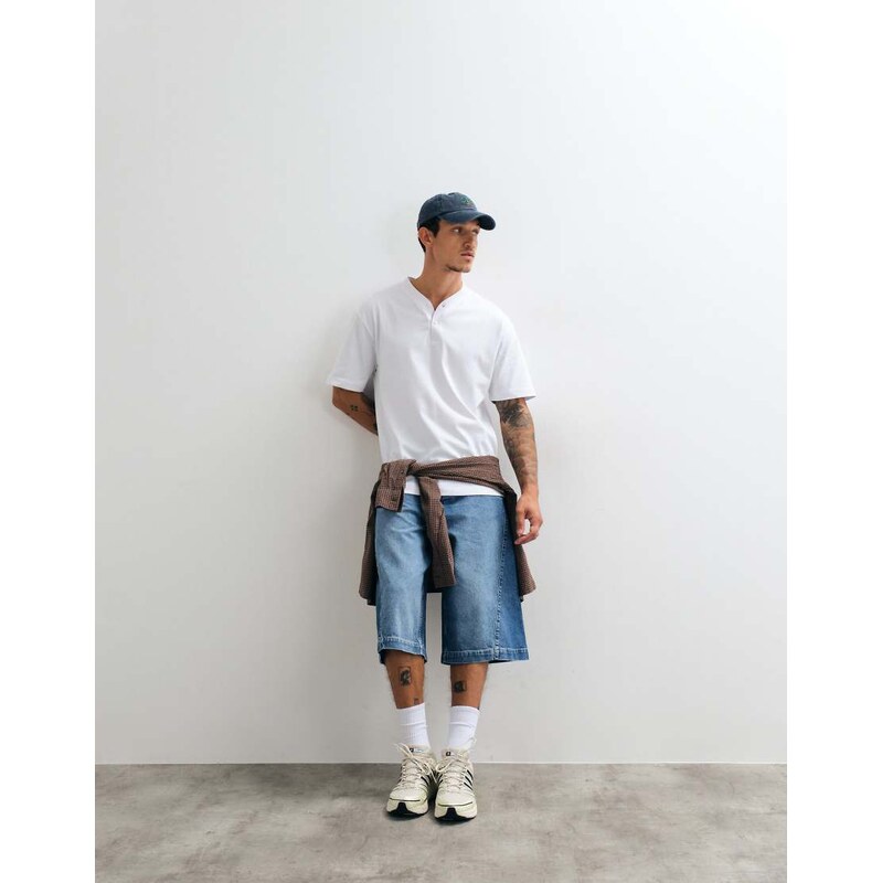 ASOS DESIGN longer length denim jorts in mid washed blue