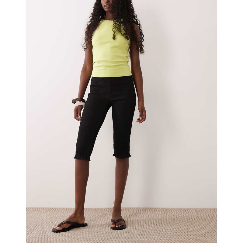ASOS DESIGN cotton shirred ruffle hem capri in black