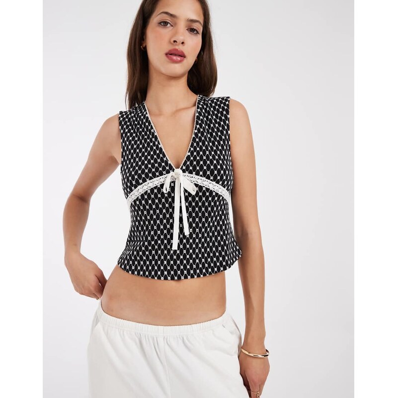 Free People Good Graces v neck top in black polka dot-Multi