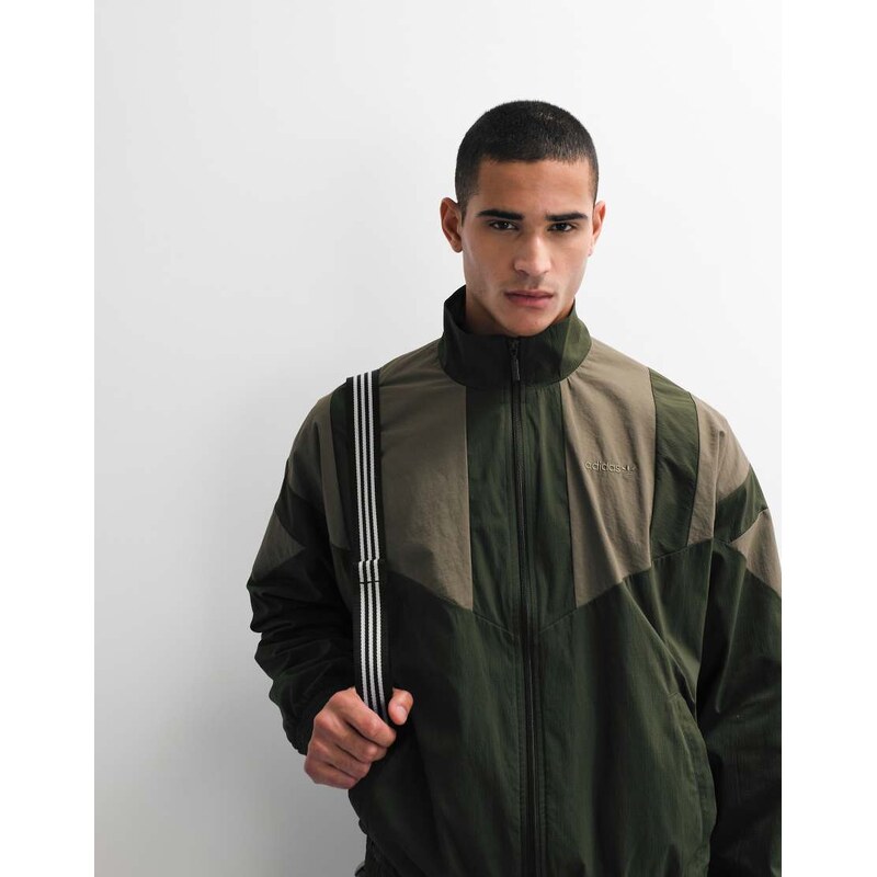 adidas Originals Munich woven track top in khaki-Green