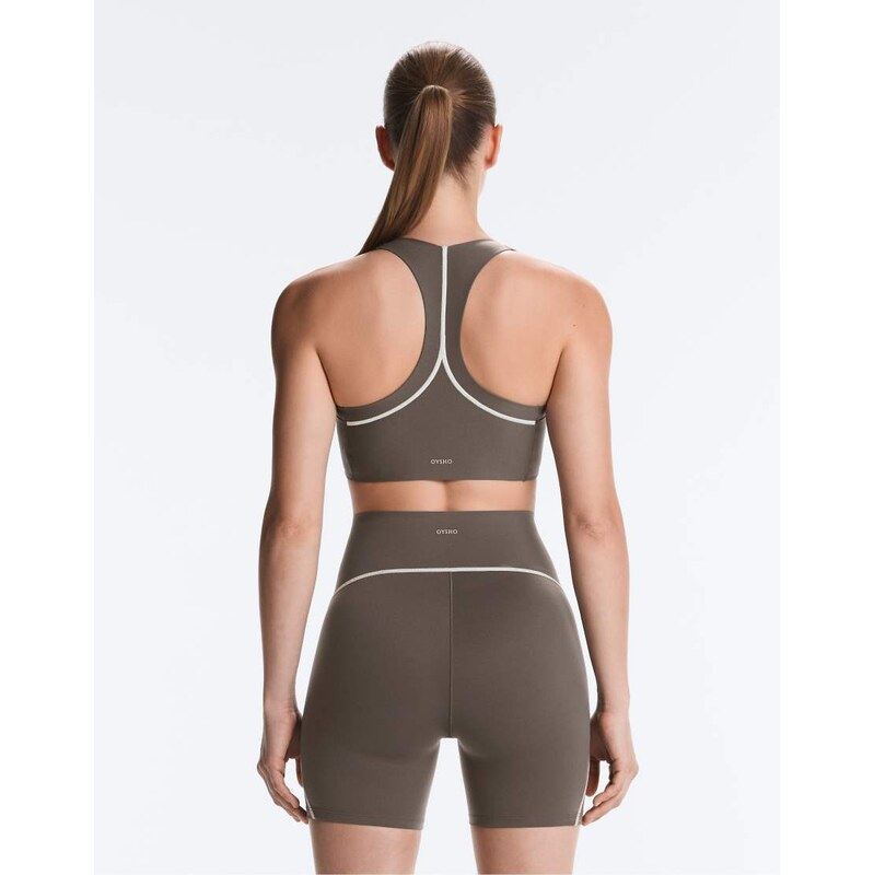 OYSHO Perfect-adapt reflective medium-support sports bra in