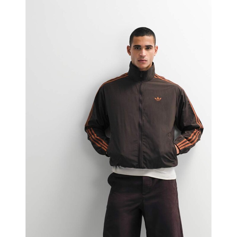 adidas Originals firebird woven track top in brown