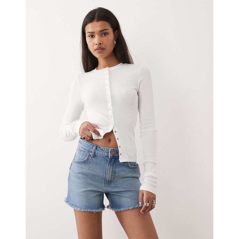 Wrangler denim mini shorts in medium blue wash