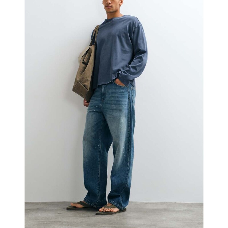 Carhartt WIP landon loose fit tapered jeans with paint splatter