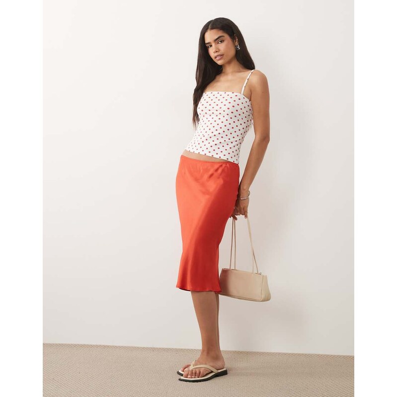 ASOS DESIGN 90s slip skirt in red satin