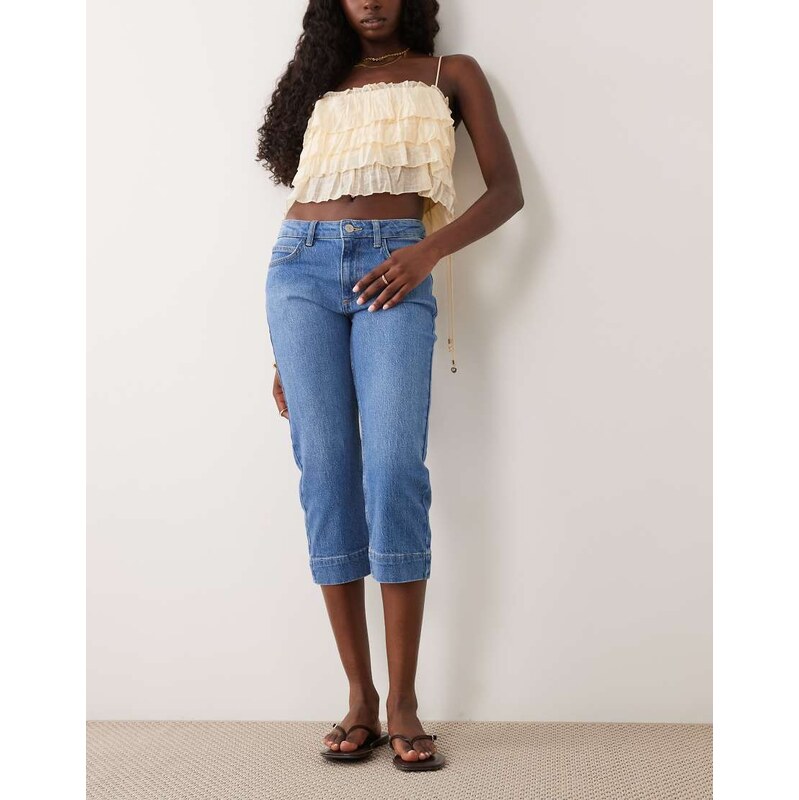 ASOS DESIGN low rise jean capris in midwash blue