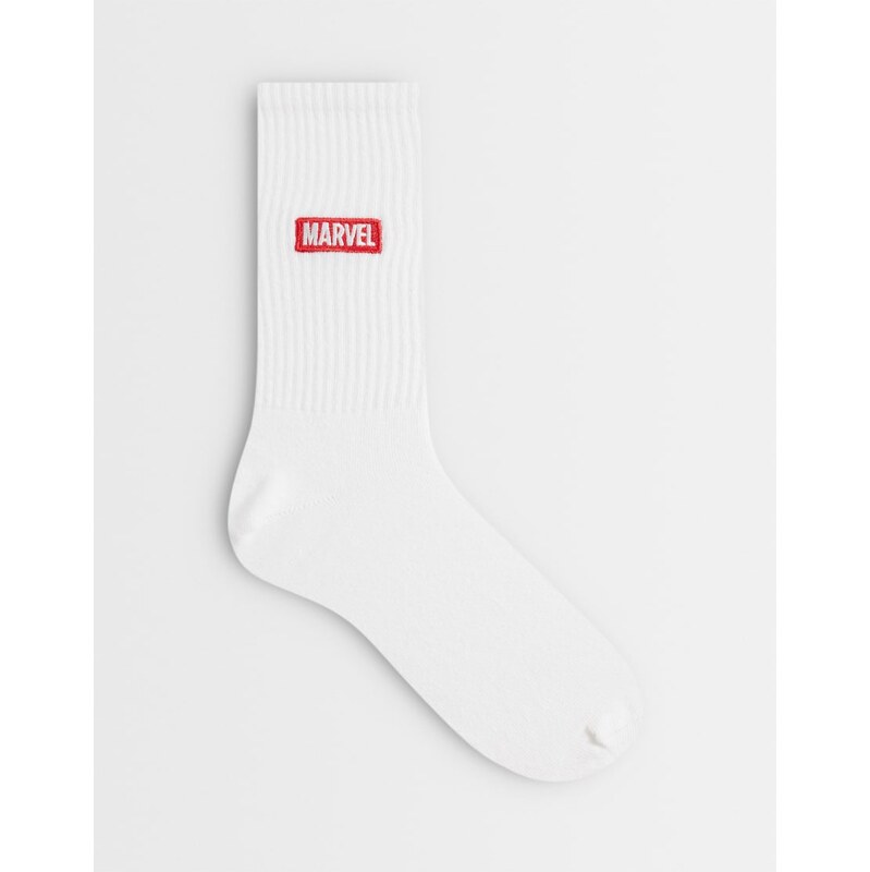 ASOS DESIGN socks with marvel logo in white