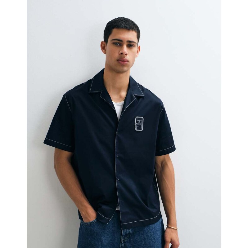 Lacoste short sleeve button through logo polo shirt in navy