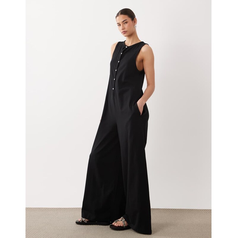 ASOS DESIGN button through jumpsuit with pockets in black