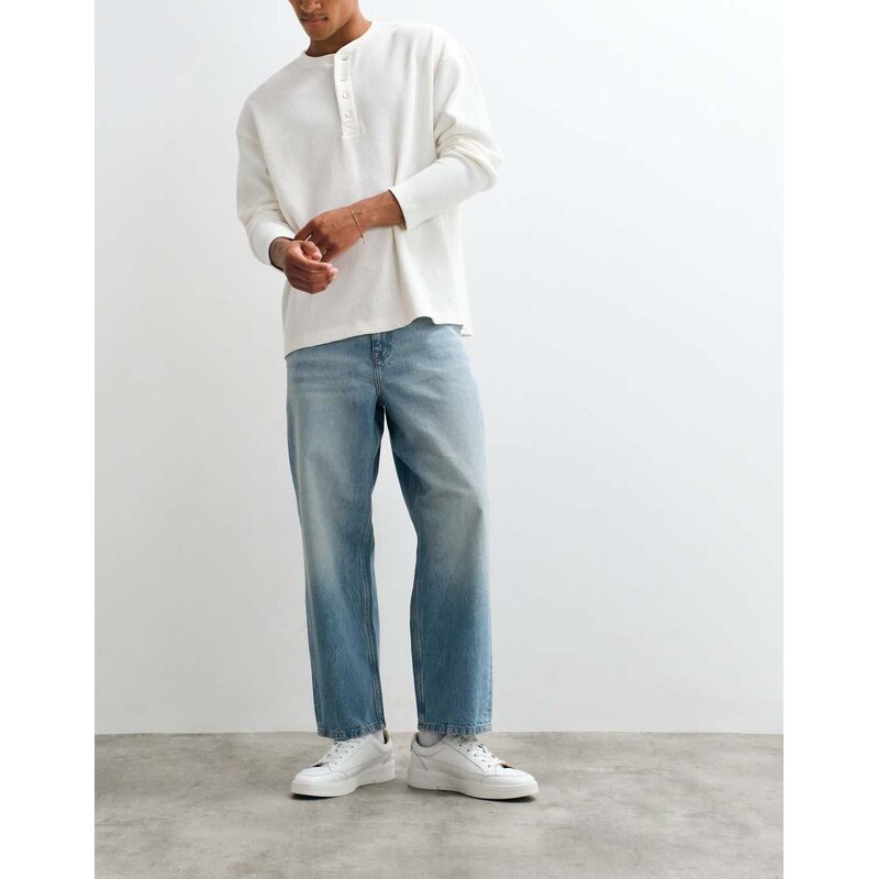 ASOS DESIGN relaxed tapered jeans in vintage light wash blue