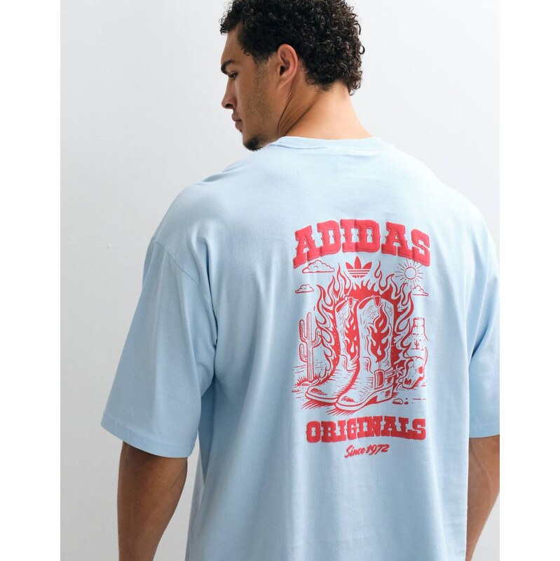 Adidas Originals cowboy graphic t-shirt in blue