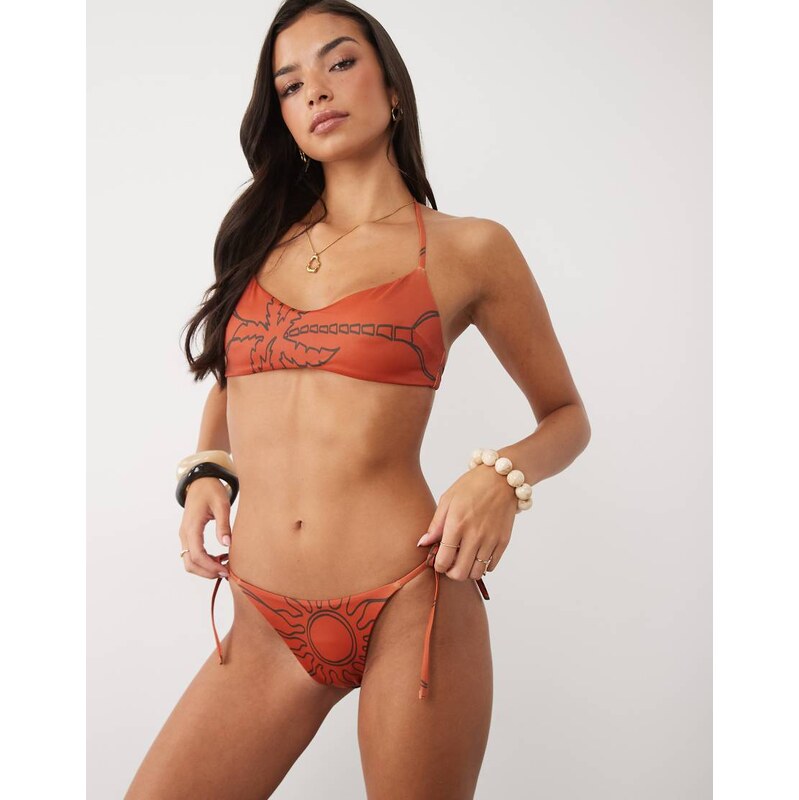 ASOS DESIGN Brogan tie side bikini bottom in terracotta palm