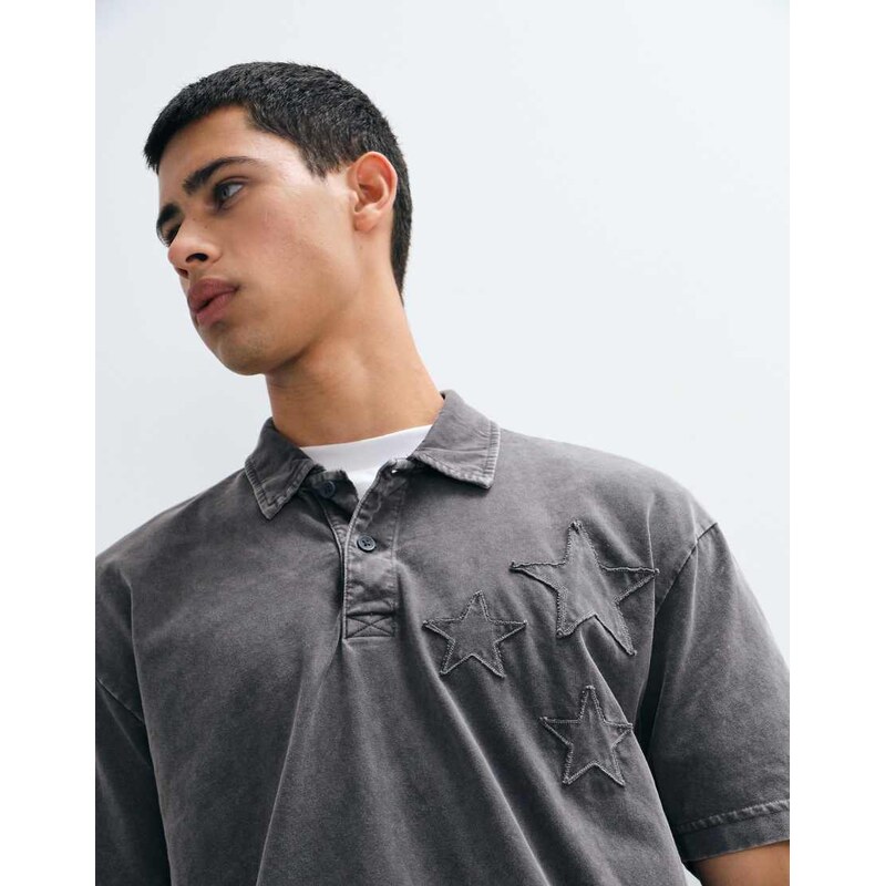 Hollister boxy short sleeve polo with star detail in black