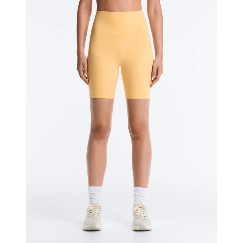 OYSHO Comfortlux high-rise 20cm short leggings in yellow