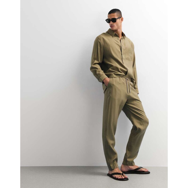 ASOS DESIGN co-ord relaxed tapered trousers in khaki-Yellow