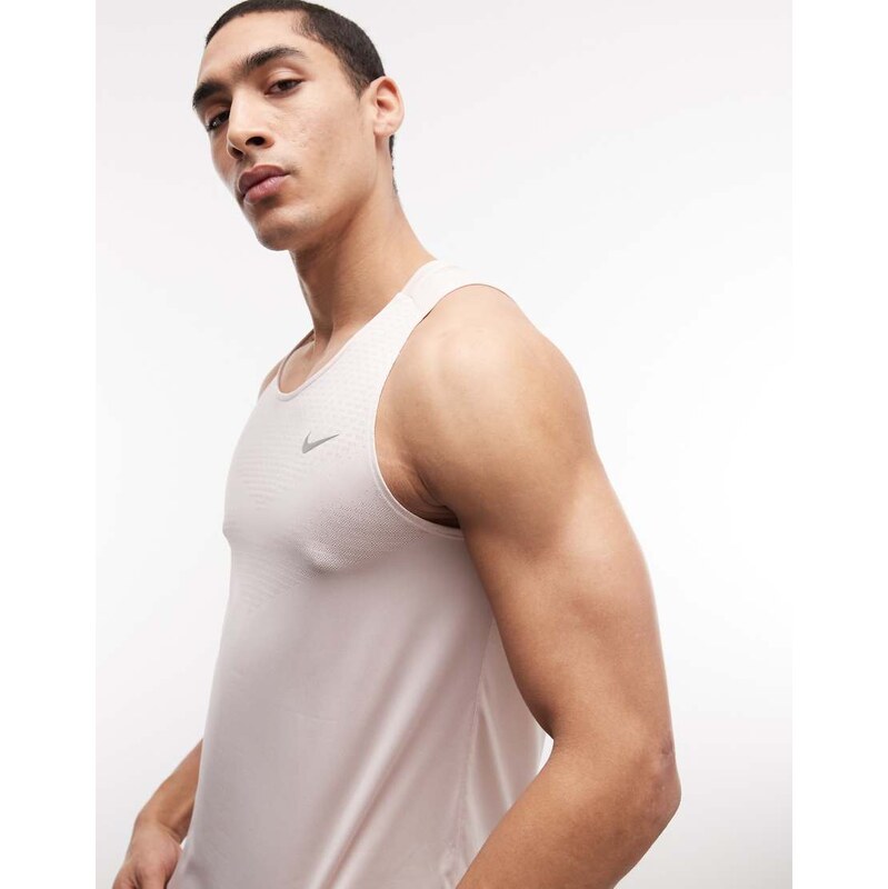 Nike Running Stride Dri-FIT vest in light pink