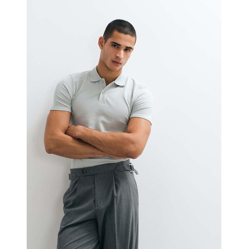 ASOS DESIGN Essentials muscle fit polo in green pique
