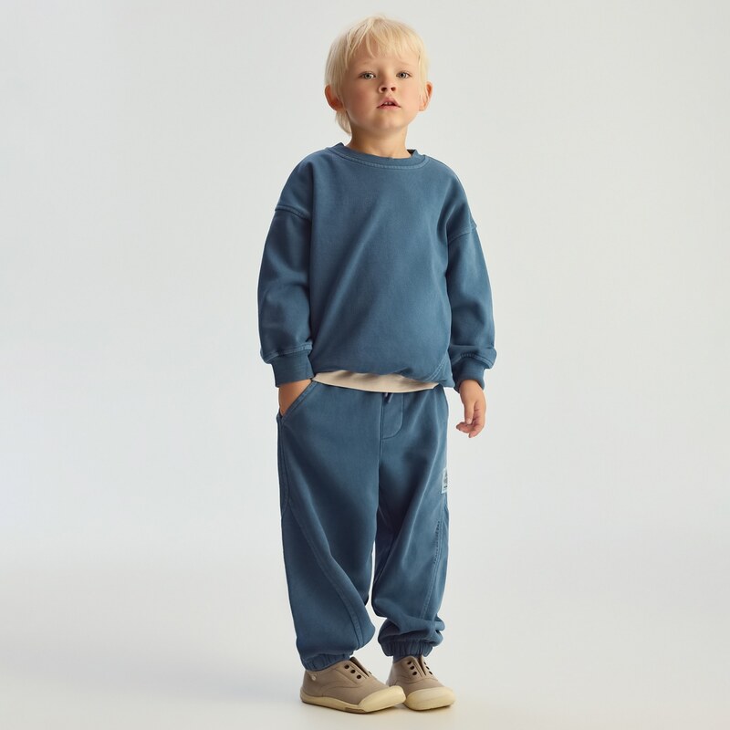 Reserved - Kalhoty joggers - modrá