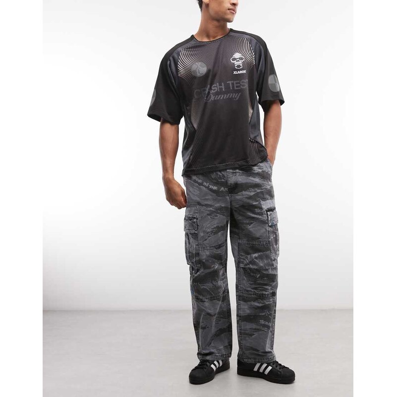 Aape by A Bathing Ape loose fit cargo trousers in black camo