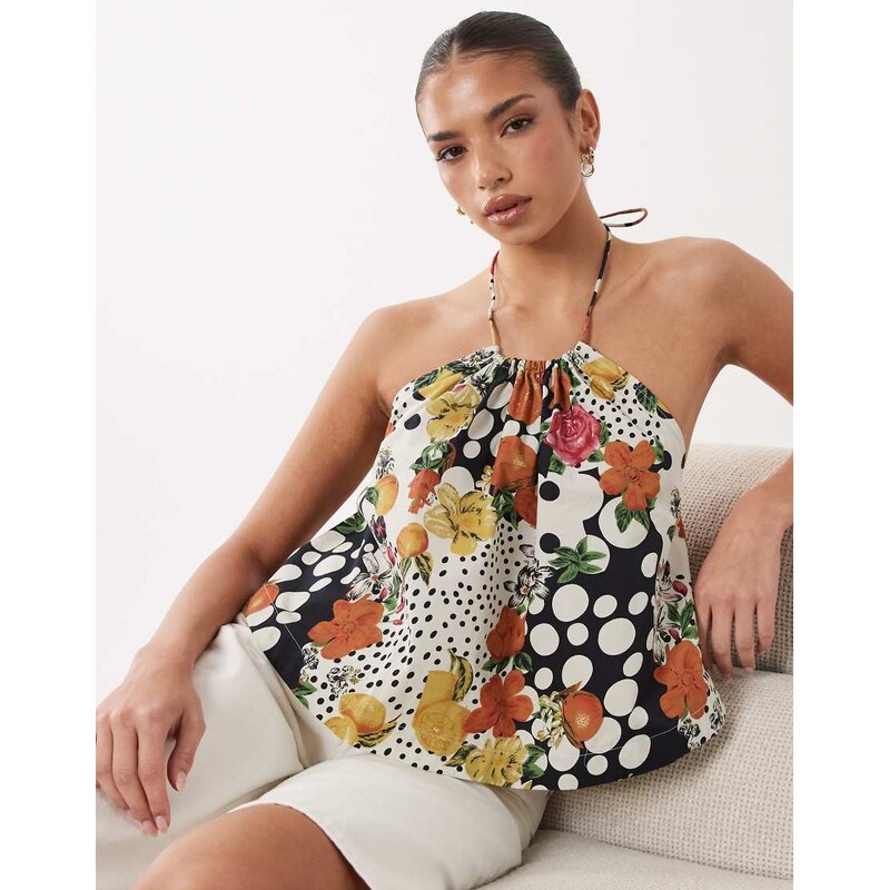 ASOS DESIGN halterneck volume cropped vest in polka dot fruit