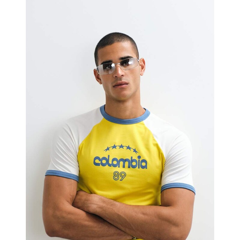 ASOS DESIGN muscle ringer t-shirt with Colombia graphic in cream
