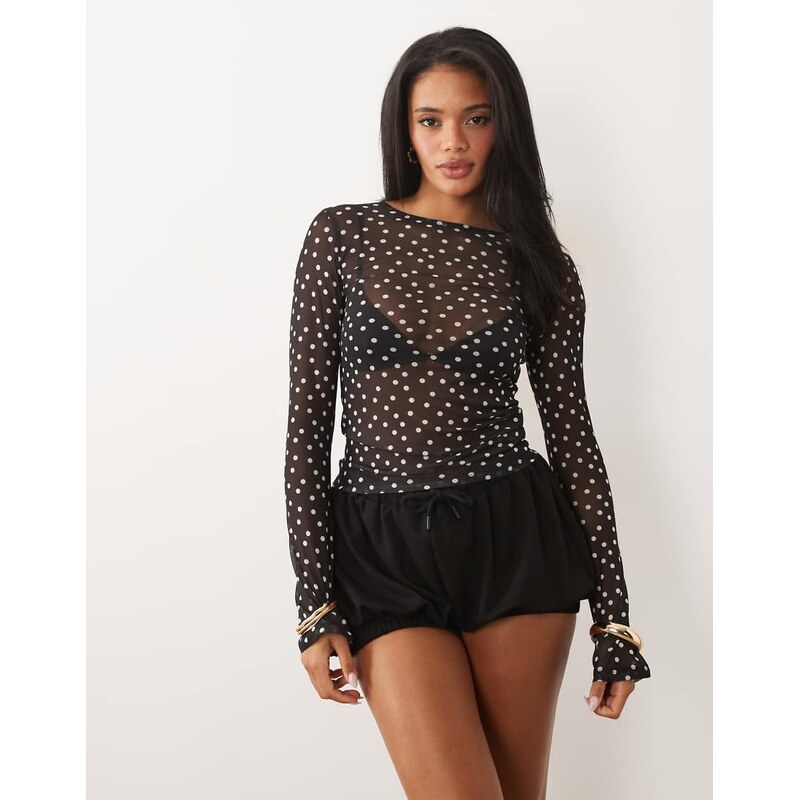 ASOS DESIGN sheer mesh flare long sleeve top in black polka dot