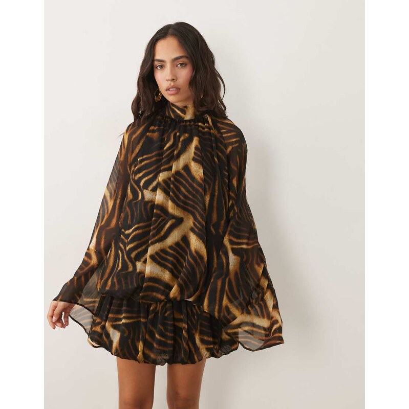 ASOS DESIGN tie neck bubble mini dress in abstract animal print