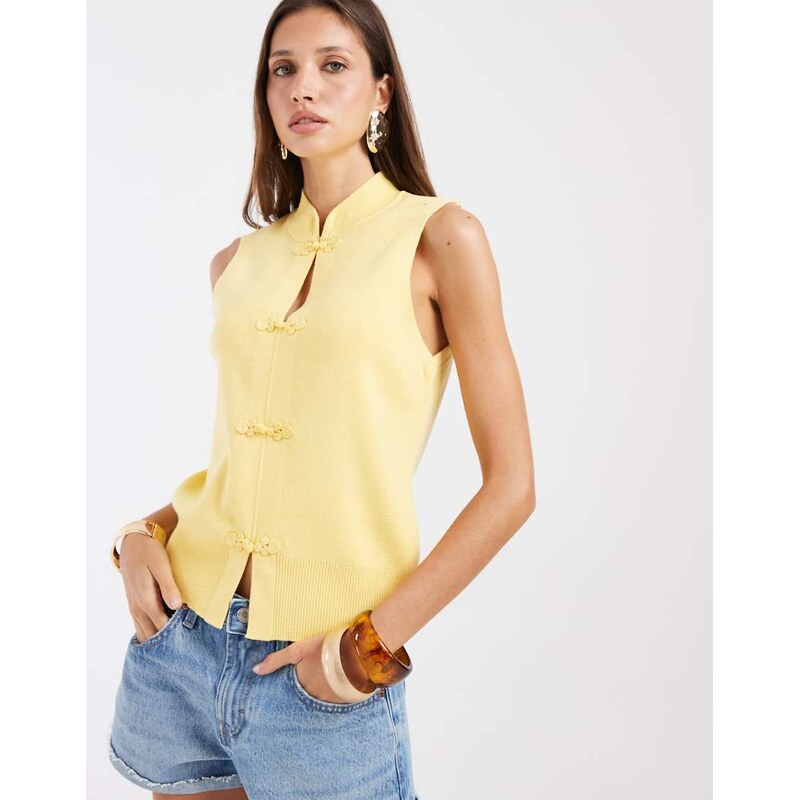 ASOS DESIGN frogging front knitted vest in pale yellow