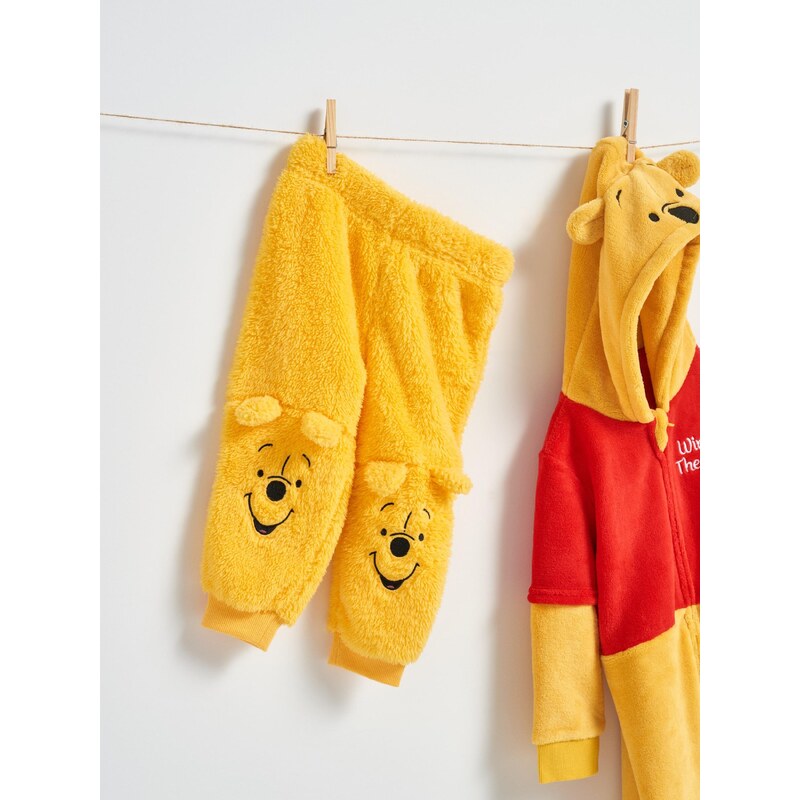 Sinsay - Kalhoty Winnie the Pooh - hořčicová