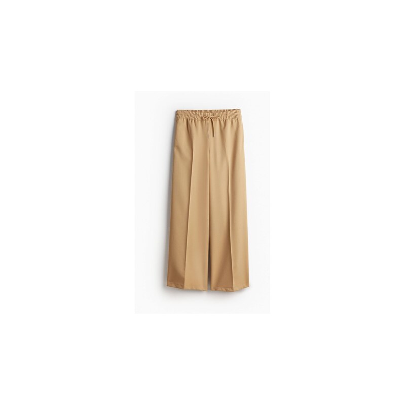 H&M - Široké natahovací kalhoty - Béžová