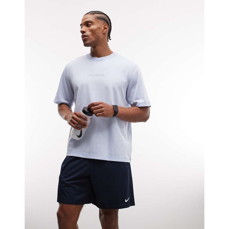 Nike Training Athletic Club script logo perforated t-shirt in