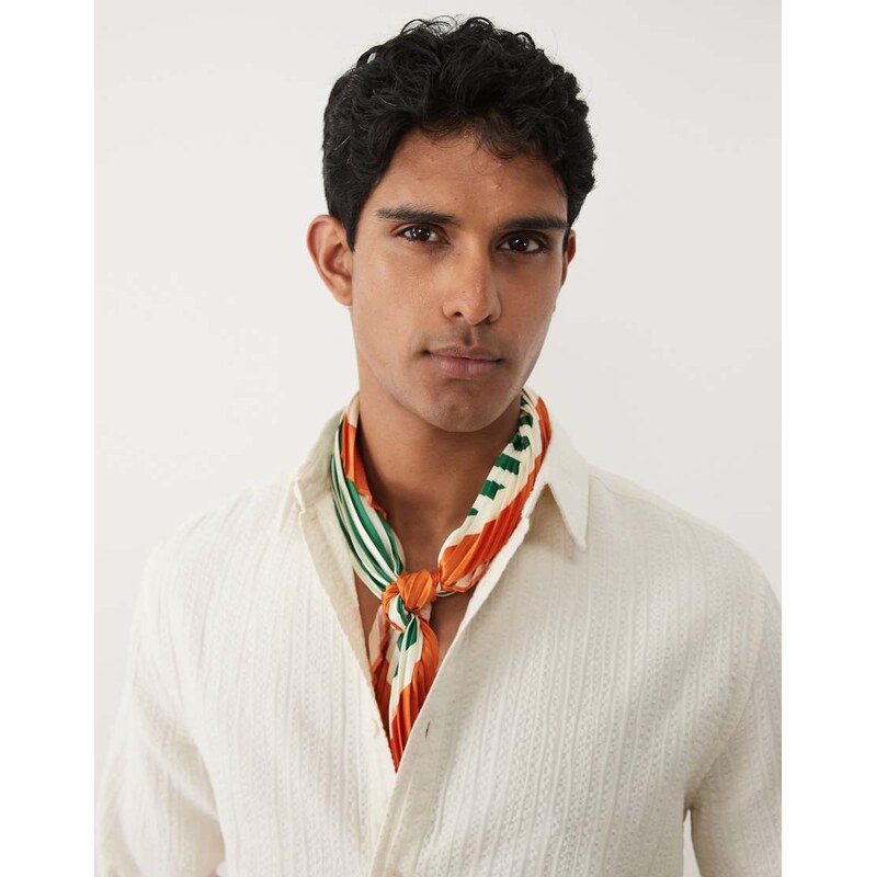 ASOS DESIGN crinkled satin scarf with geometric pattern in green
