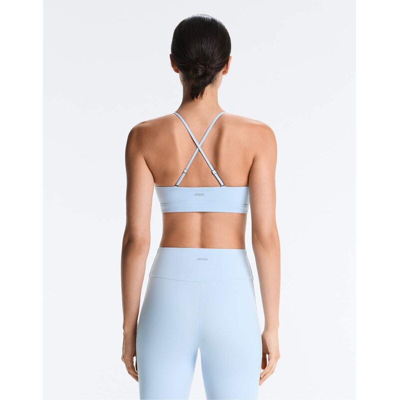 OYSHO Comfortlux light-support sports bra with crossover straps