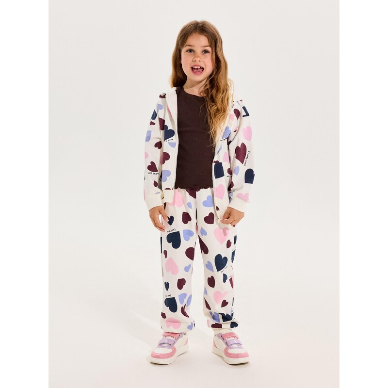 Sinsay - Jogger tepláky s motivem srdcí fleece - krémová