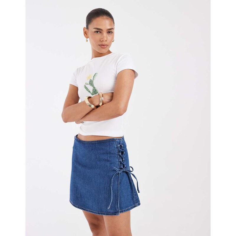 Vero Moda tie side detail denim mini skirt in medium blue wash